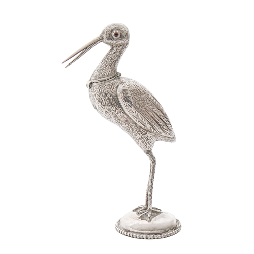 Appraisal: A Continental stork novelty lighter with red glass bead eyes