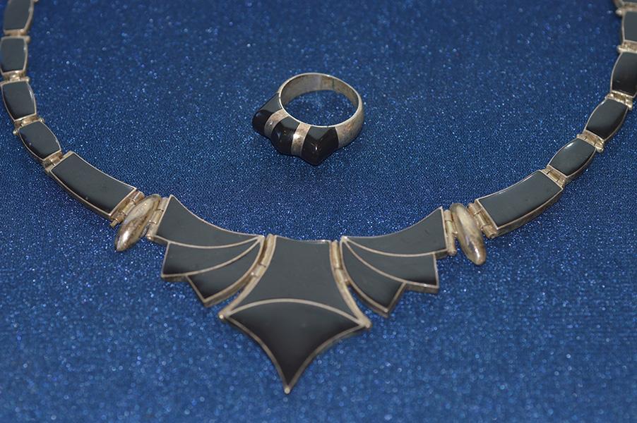 Appraisal: A CHILEAN SILVER JEWELLERY SUITE INCLUDING RING AND NECKLACE SET