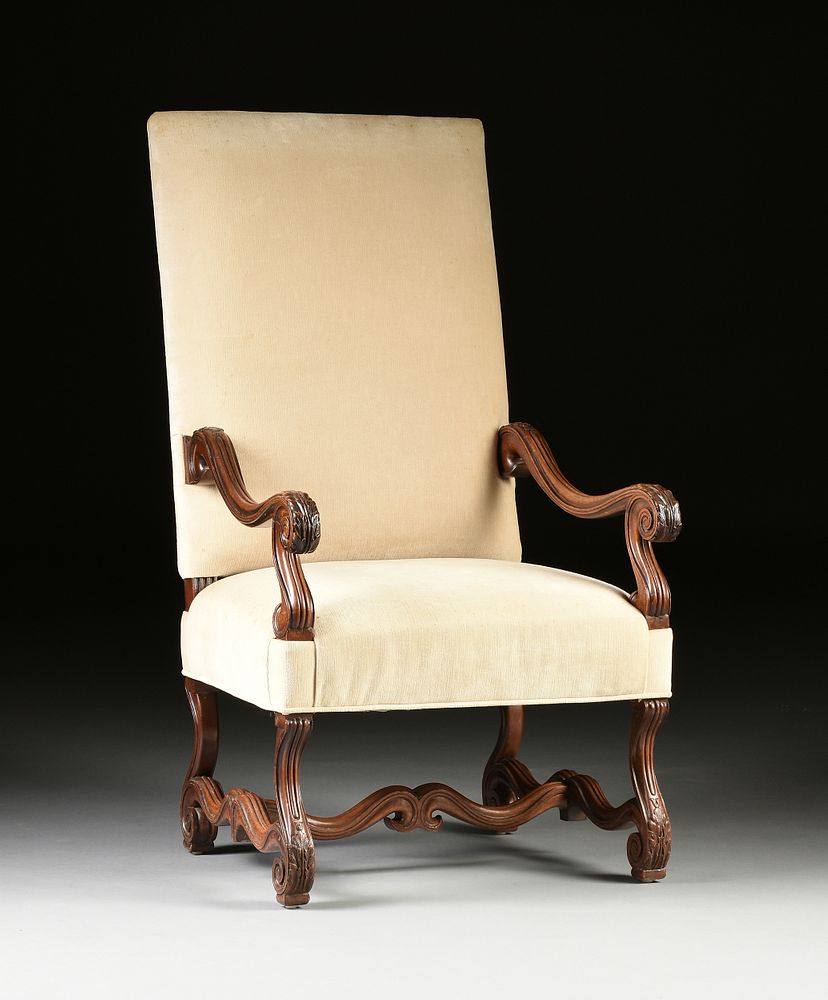 Appraisal: A LOUIS XIV STYLE VELVET UPHOLSTERED AND CARVED WALNUT ARMCHAIR