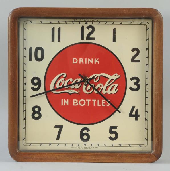 Appraisal: s Coca-Cola Clock This Coca-Cola clock has a wooden frame