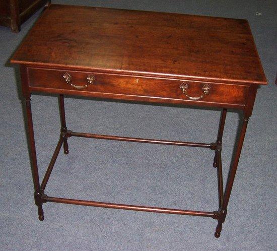 Appraisal: A mahogany side table of Chippendale design fitted a drawer