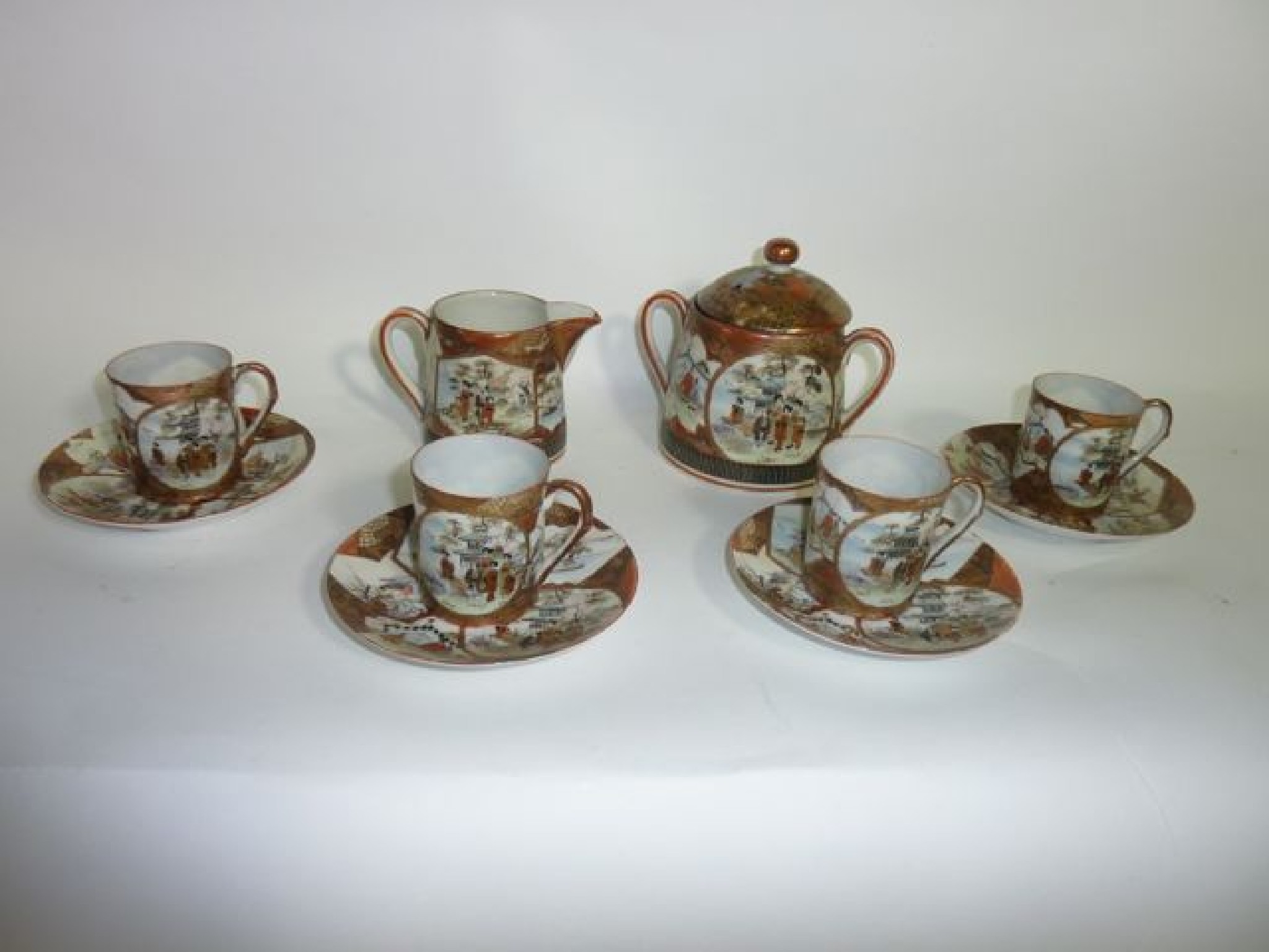 Appraisal: A collection of Japanese eggshell porcelain coffee wares with painted