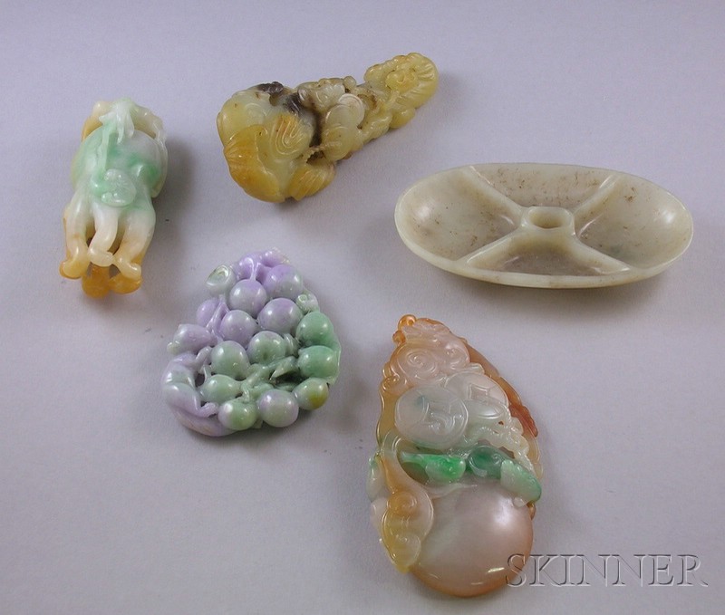 Appraisal: Five Asian Carved Stone Items a green and purple carved