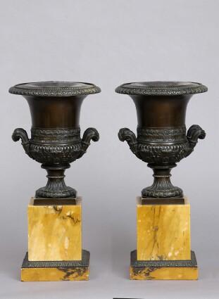 Appraisal: PAIR OF ITALIAN GRAND TOUR BRONZE URNS ON MARBLE PEDESTALSWith