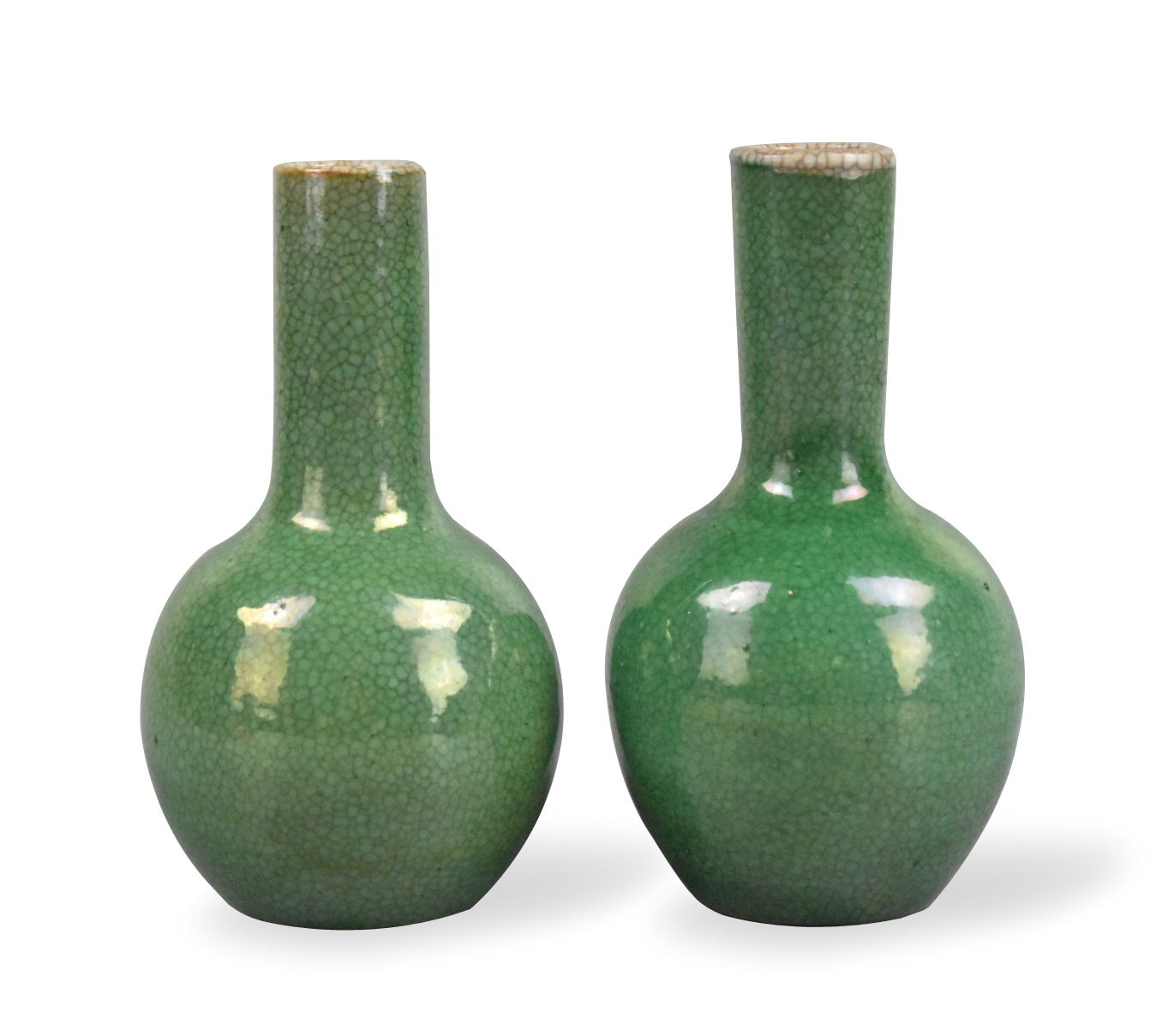 Appraisal: A pair of Chinese green glazed globular vases dating from