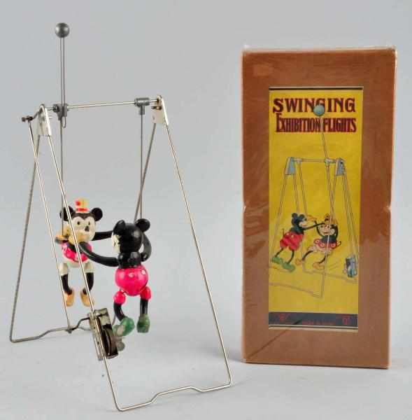 Appraisal: Celluloid Mickey Minnie Acrobats Wind-Up Toy Description Japanese Working Figures