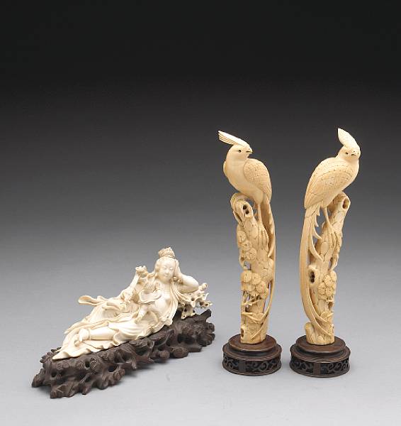 Appraisal: A group of three ivory carvings th Century Including a