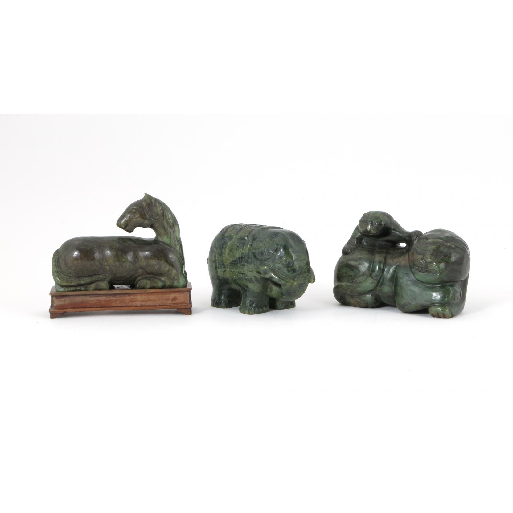 Appraisal: Group of Animals in Spinach Jade comprised of an elephant