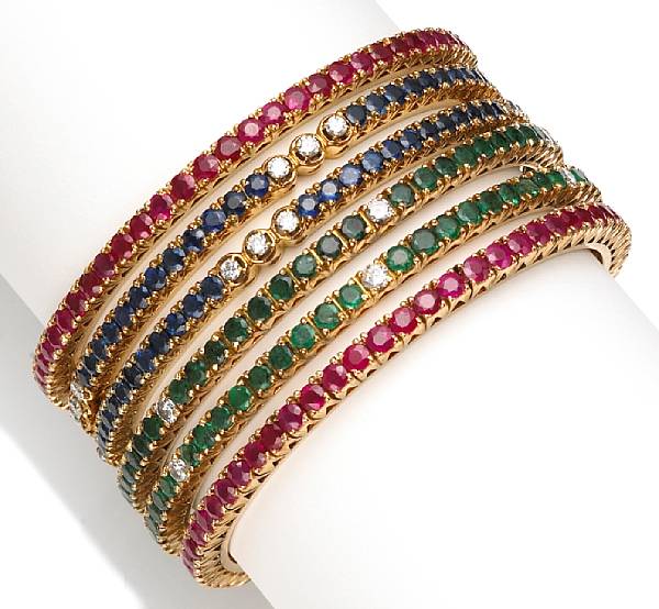 Appraisal: A group of six gem-set and diamond bangles mounted in