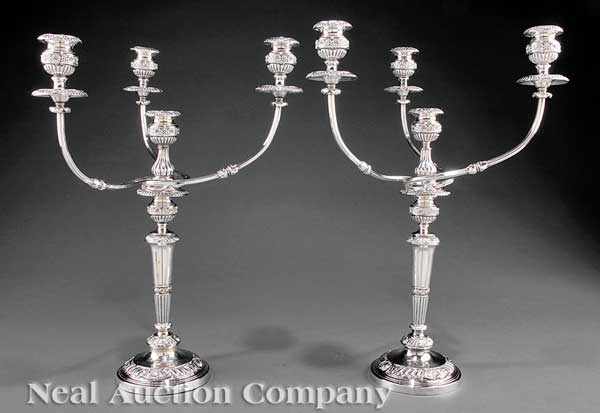 Appraisal: A Pair of Sheffield Plate Four-Light Candelabra early th c