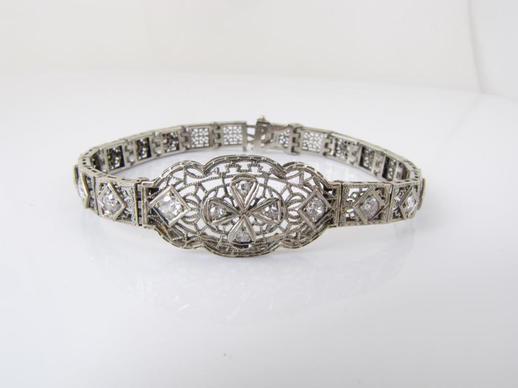 Appraisal: links each with one round cut approximately ct diamond filigree