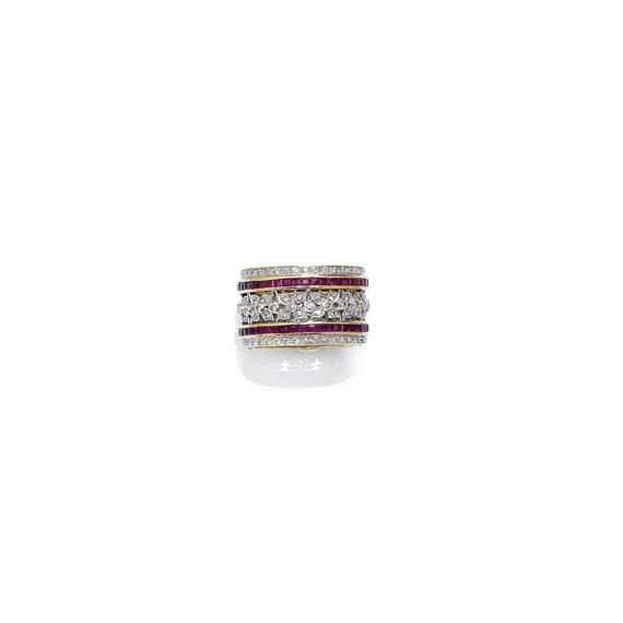 Appraisal: A DIAMOND AND RUBY RING Yellow and white gold Fancy