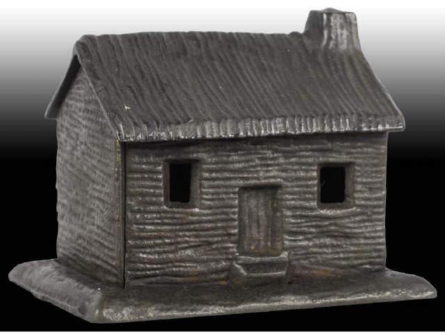 Appraisal: Cast Iron Log Cabin Still Bank Description Made in US