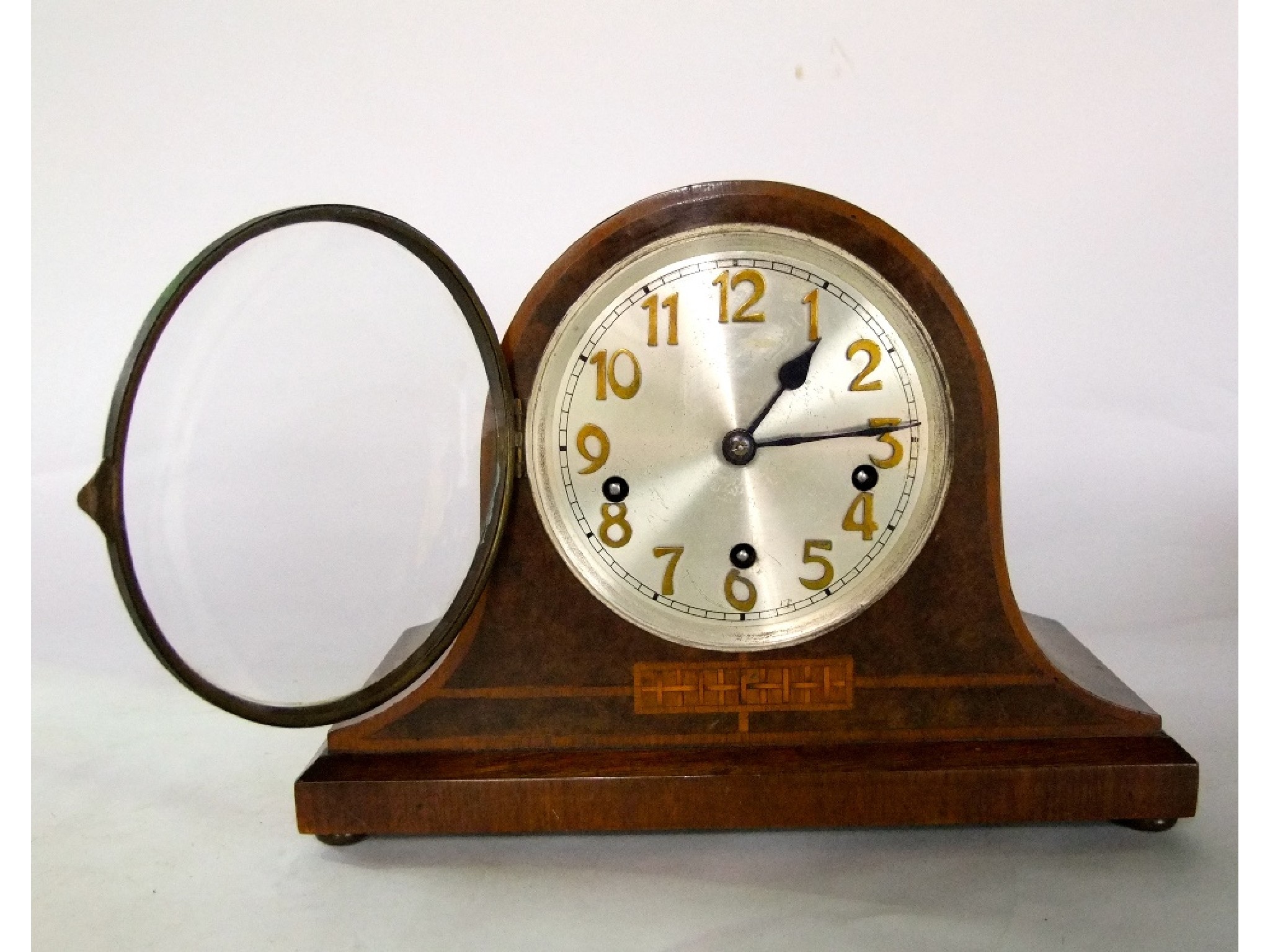 Appraisal: A s top hat three train mantle clock the case