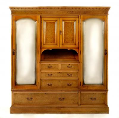 Appraisal: A LATE VICTORIAN SATIN ASH AND BURR ELM TRIPLE WARDROBE