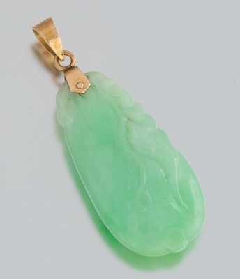 Appraisal: A Carved Jadeite Pendant with Gold Bale Carved as a