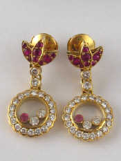 Appraisal: Chopard A pair of carat gold Happy Diamond earrings by