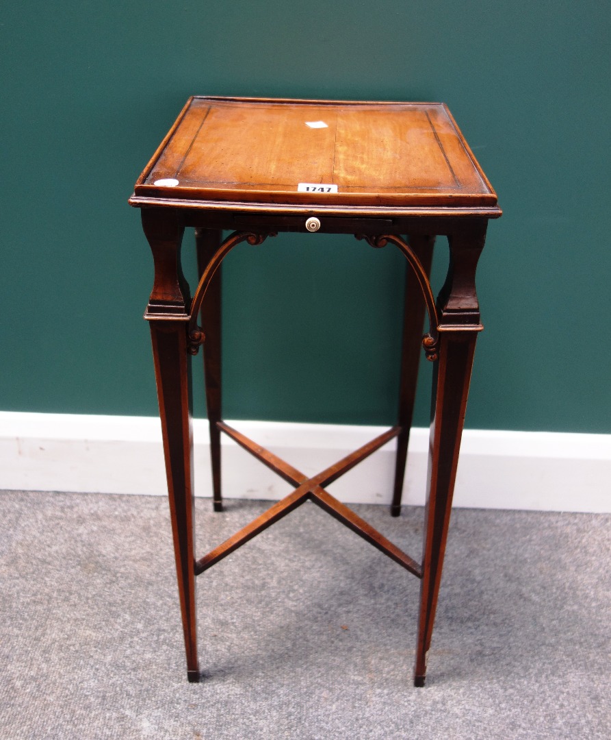 Appraisal: A George III mahogany kettle stand the square top over