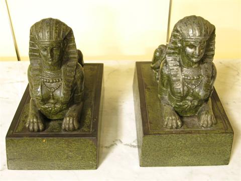 Appraisal: PAIR PATINATED SPHINX MODELS Of white metal with verdigris patina