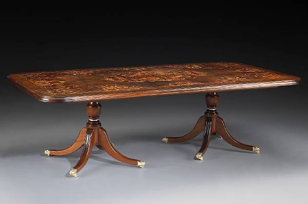 Appraisal: An Italian marquetry double pedestal dining table in the Regency