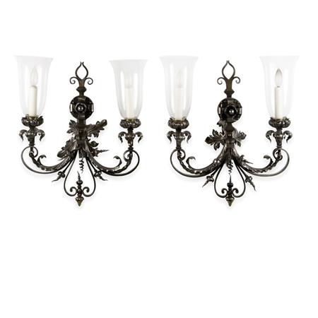 Appraisal: Pair of Italian Baroque Style Silvered Metal Two-Light Sconces Estimate