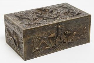 Appraisal: Japanese Antique Box Metal with Repousse Dragons Japanese box gilt