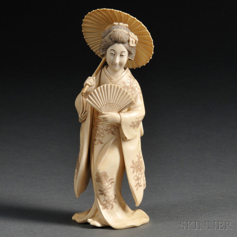 Appraisal: Ivory Okimono of a Courtesan Japan th th century walking