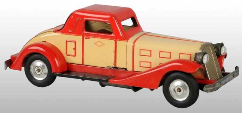 Appraisal: Pressed Steel Marx Deluxe Coupe Battery-Op Toy Description American Working