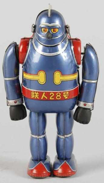 Appraisal: Tin Litho Tetsujin No Superhero Wind-Up Toy Description Japanese Working