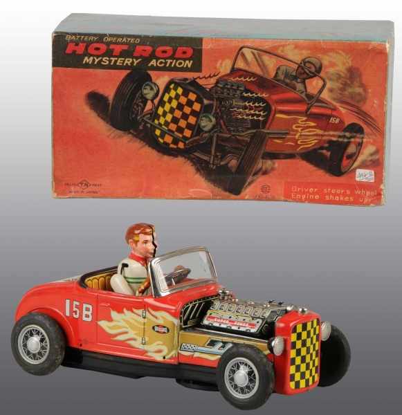 Appraisal: Tin Hot Rod Battery-Operated Toy Description Japanese Working Scarce large