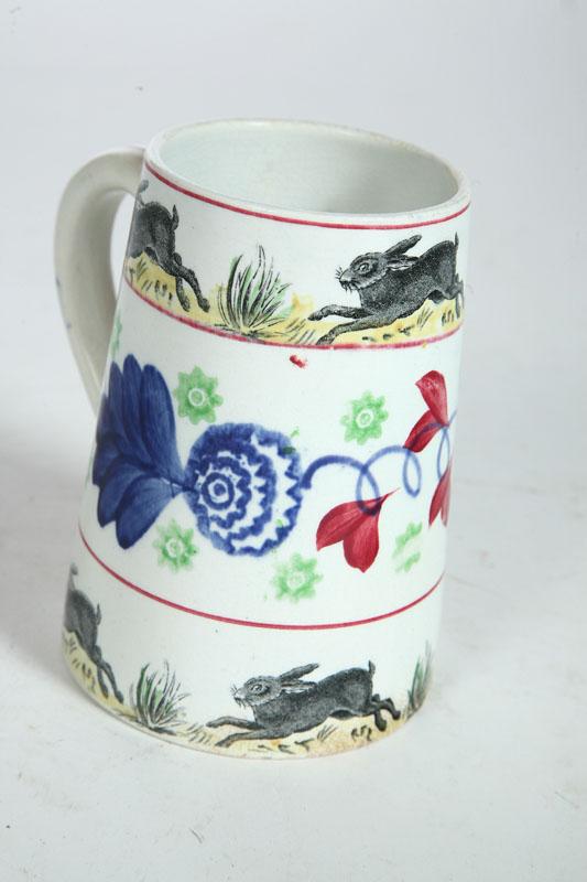 Appraisal: STICK SPATTER MUG England mid th century Gaudy floral stick