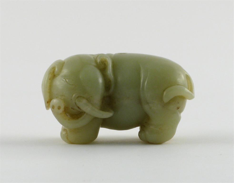 Appraisal: A Chinese pale yellowish-green jade carving of an elephant