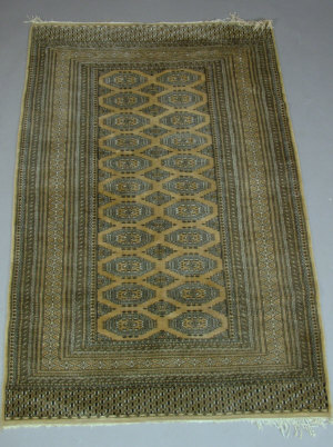 Appraisal: A Pakistan rug with two rows of octagons x cm