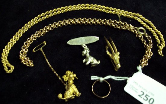 Appraisal: Two chains two poodle brooches another brooch and a gold