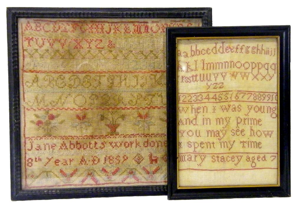 Appraisal: Victorian woolwork sampler decorated with the alphabet and flowers and