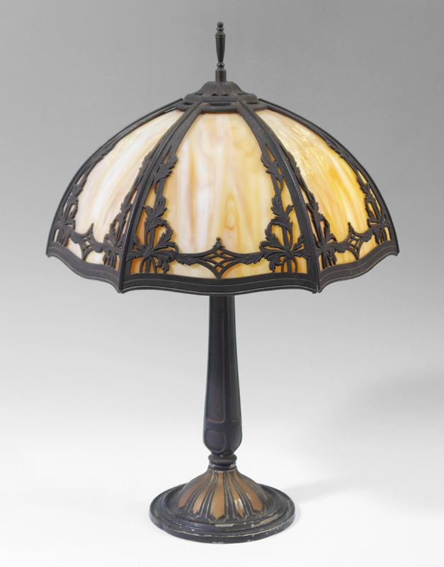 Appraisal: BRADLEY HUBBARD CARAMEL SLAG GLASS LAMP Heavy cast iron base