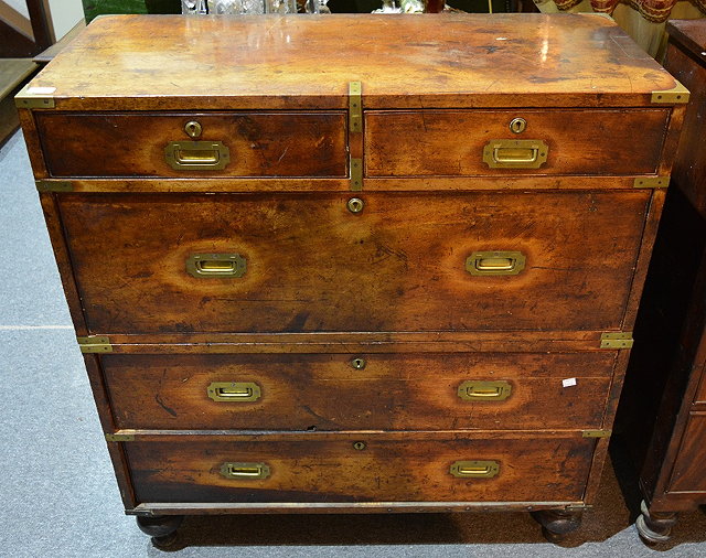 Appraisal: A th Century mahogany and brass bound campaign chestwith sunk