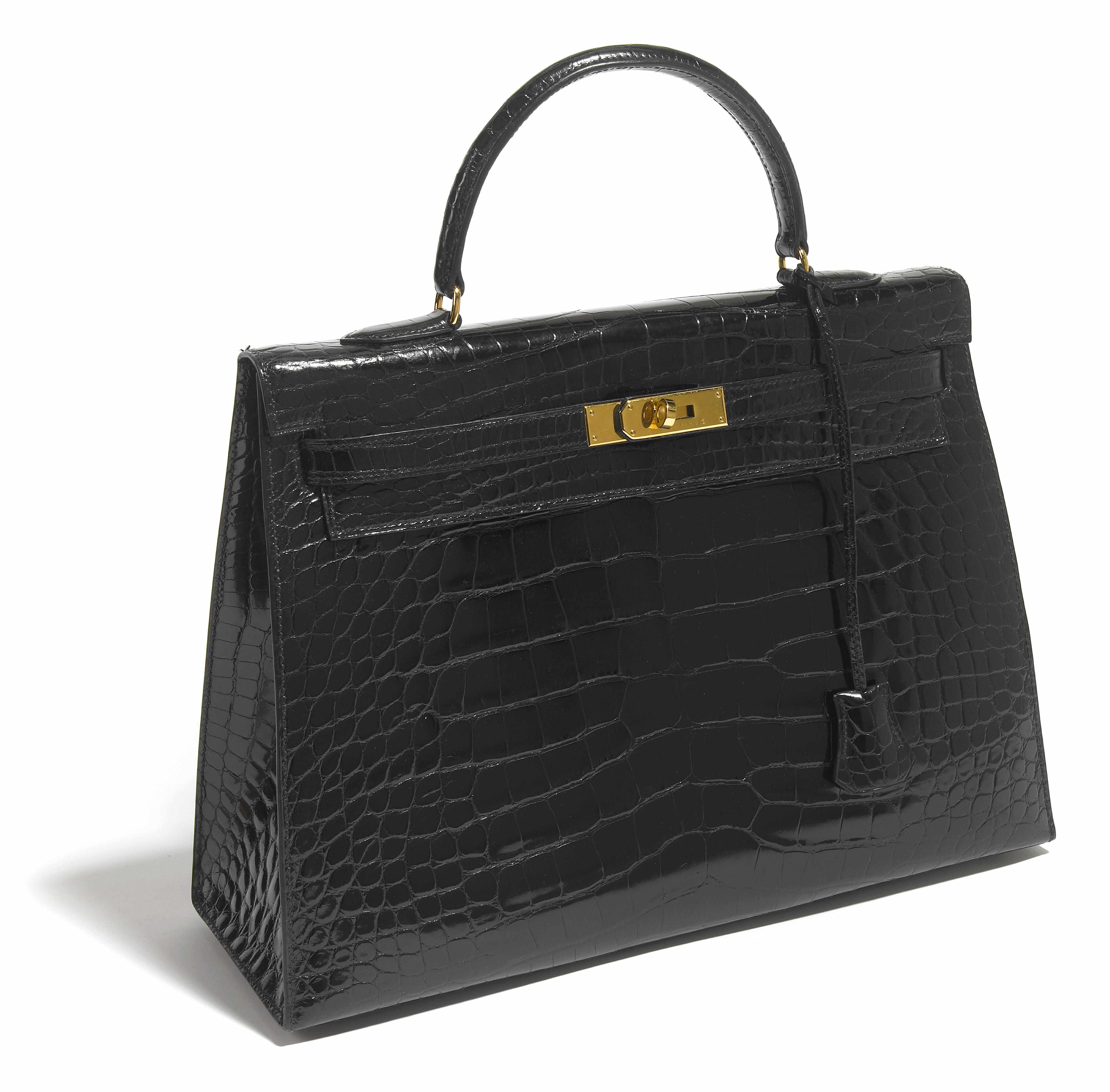 Appraisal: An Herms black crocodile 'Kelly' handbag size in x in