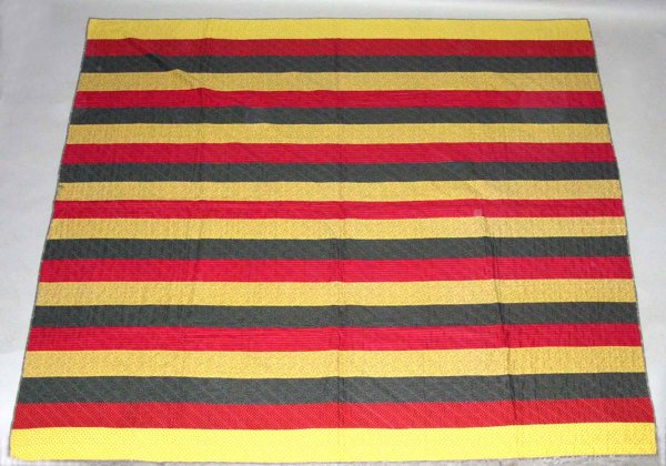 Appraisal: Striped Joseph's Coat quilt Red yellow and green Gray back