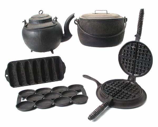 Appraisal: A group of cast iron articles comprising two waffle irons