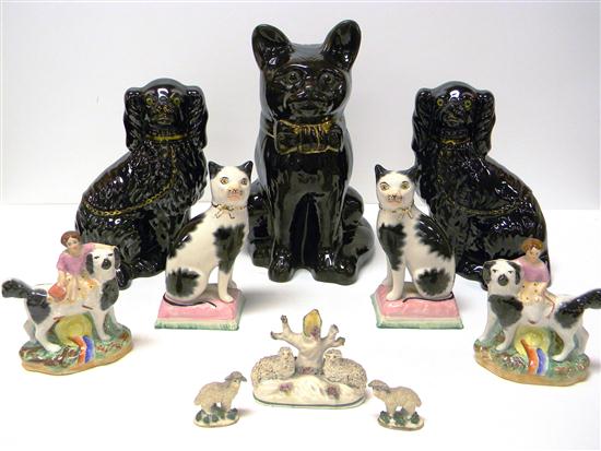 Appraisal: Staffordshire figures small th C pair cats black and white