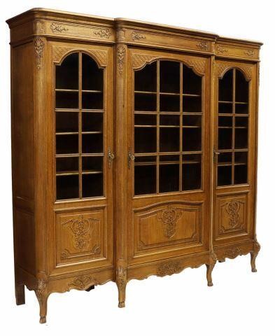 Appraisal: Belgian Louis XV style breakfront display cabinet th c foliate