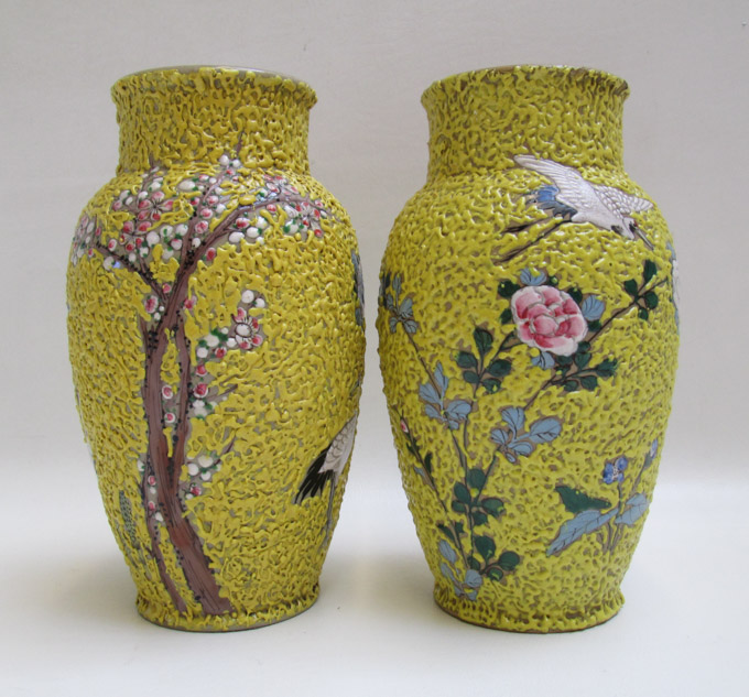 Appraisal: TWO CHINESE EARTHENWARE VASES of baluster form decorated with enamel