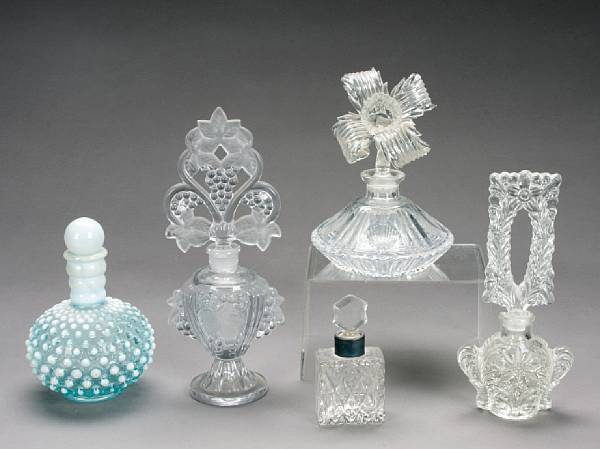 Appraisal: A group of ladies glass perfume bottles height of largest