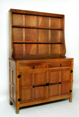 Appraisal: AN ADZED OAK DRESSER by Robert Mouseman Thompson the delft