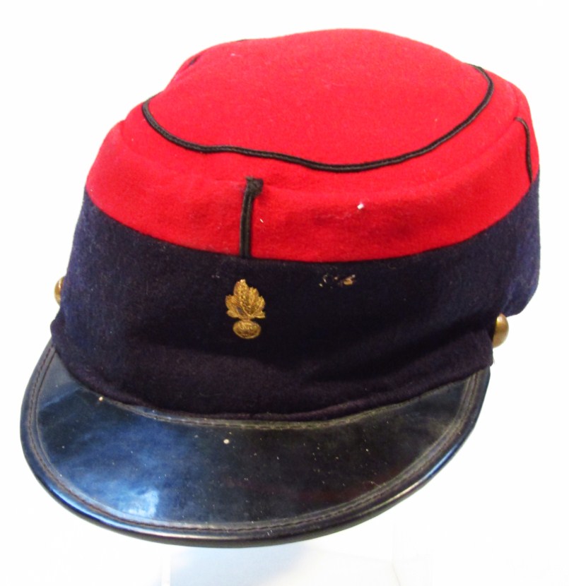 Appraisal: A thC French cap in red and blue with embroidered