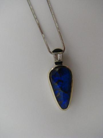 Appraisal: K White Gold Pendant with Lapis Lazuli and two baguette