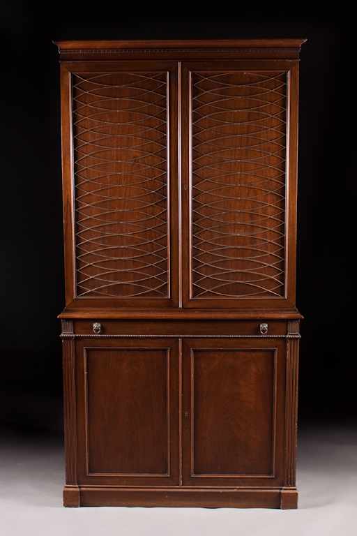 Appraisal: Regency style mahogany bookcase th century blind door top section