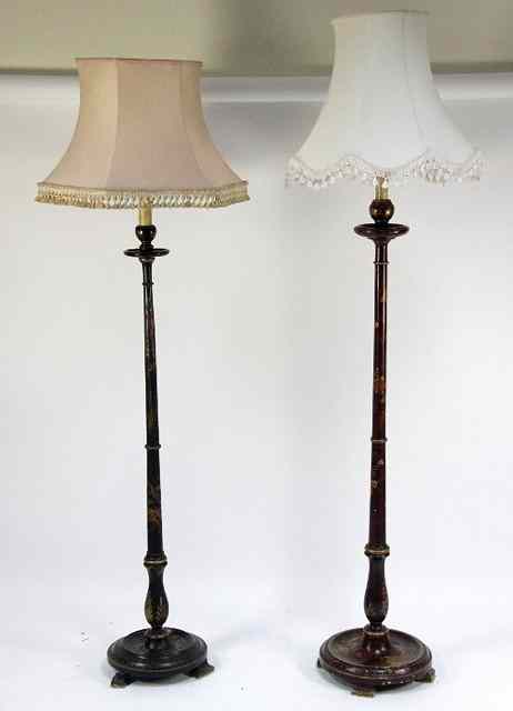 Appraisal: A pair of Edwardian standard lamps painted and decorated in