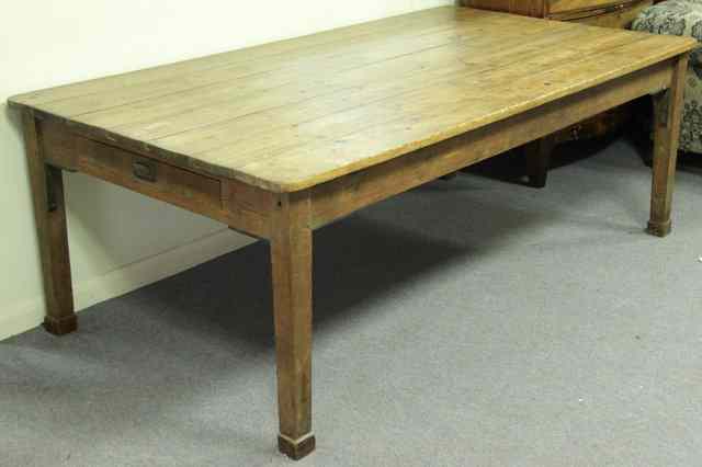 Appraisal: A th Century pine table the rectangular seven plank top